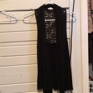 Arden’s black and lace vest